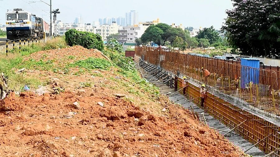 <div class="paragraphs"><p>Workers pour concrete on the at-grade section between Yeshwantpur and Chikkabanavara of the Bengaluru Suburban Railway Project's Corridor 2 (Mallige Line).</p></div>