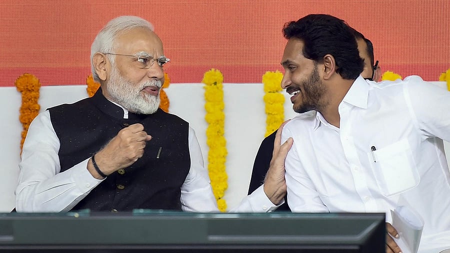 <div class="paragraphs"><p>Telangana CM Jagan Mohan Reddy (right) with PM Narendra Modi (left).</p></div>