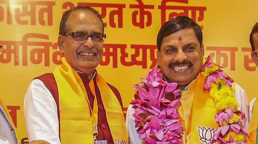 <div class="paragraphs"><p>BJP MLA from Ujjain South Mohan Yadav being greeted by Madhya Pradesh CM Shivraj Singh Chouhan.</p></div>