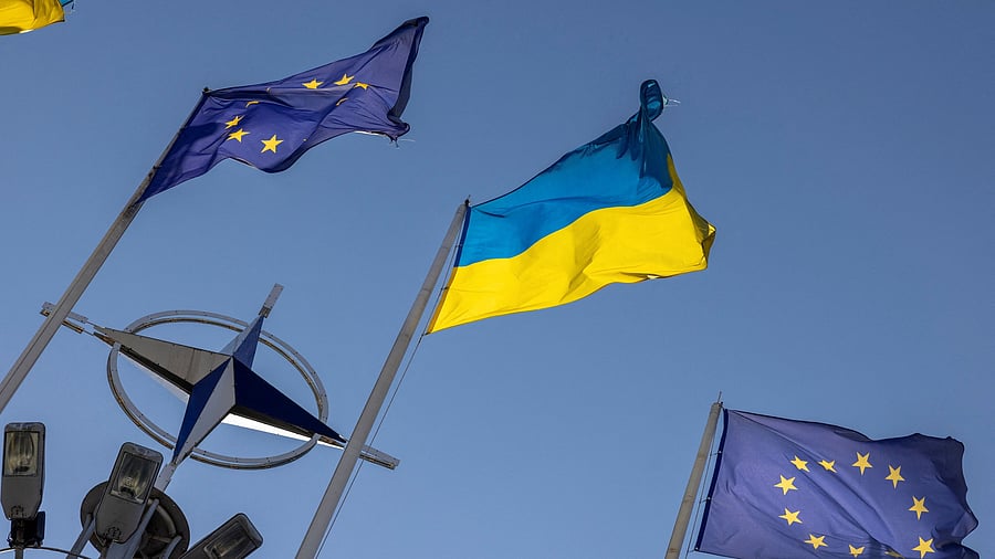 <div class="paragraphs"><p>Ukrainian and European flags fly in central Kyiv.</p></div>
