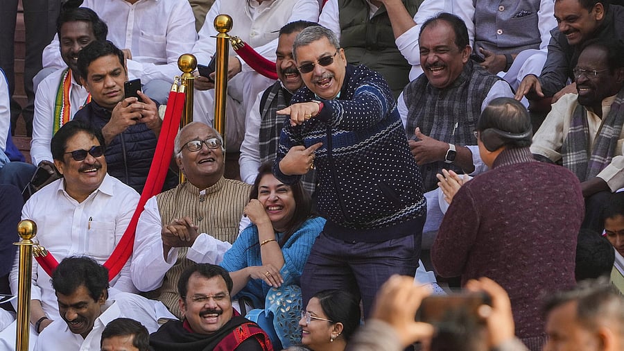 <div class="paragraphs"><p>TMC's Kalyan Banerjee and other suspended MPs stage a protest during the Winter session of Parliament.</p></div>