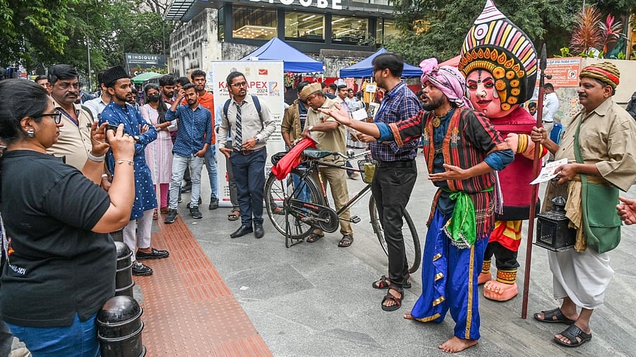 <div class="paragraphs"><p>India Post department employees staged a street play on Church Street on Friday. </p></div>
