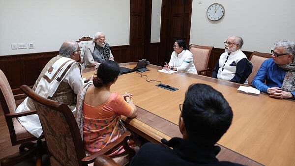 <div class="paragraphs"><p>Prime Minister Narendra Modi in a meeting with West Bengal Chief Minister and TMC supremo Mamata Banerjee and TMC MPs, in New Delhi, Wednesday, Dec 20, 2023</p></div>