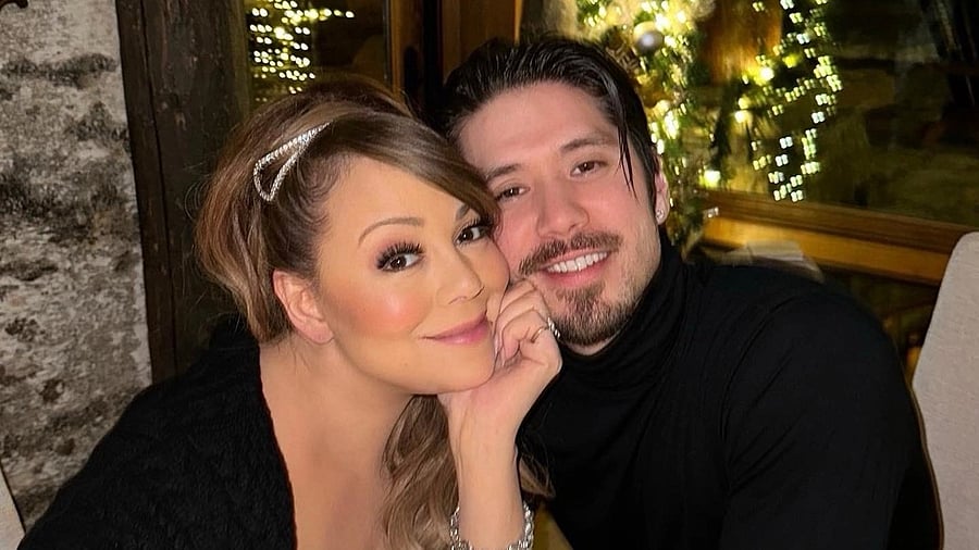 <div class="paragraphs"><p>Mariah Carey and Bryan Tanaka.</p></div>
