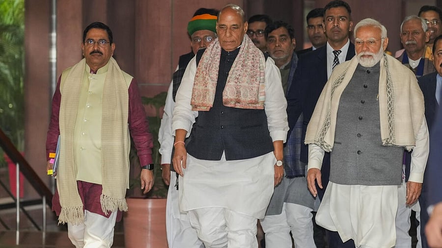 <div class="paragraphs"><p>Prime Minister Narendra Modi with Defence Minister Rajnath Singh and Union Minister Pralhad Joshi after the BJP Parliamentary Party meeting, in New Delhi.</p></div>