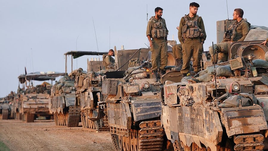 <div class="paragraphs"><p>Israe;li soldiers near the near the Israel-Gaza border.</p></div>