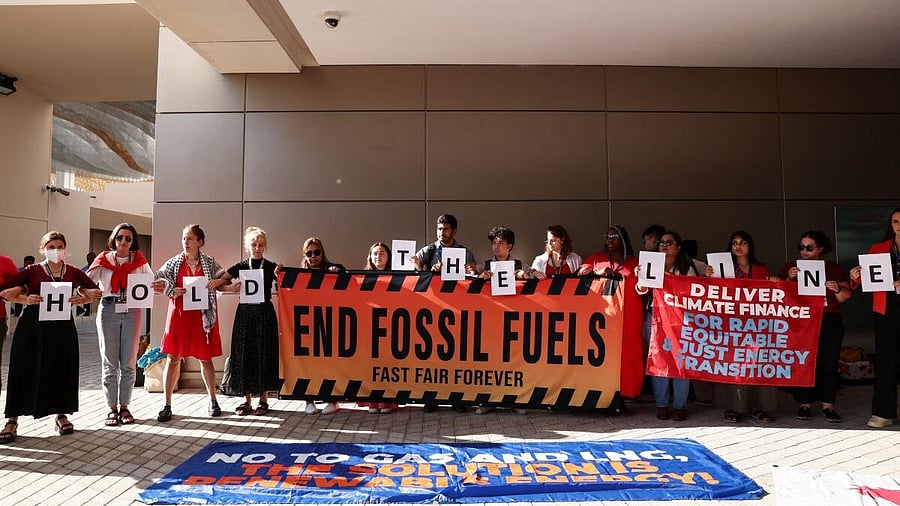 <div class="paragraphs"><p>Climate activists protest during the United Nations Climate Change Conference COP28 in Dubai, United Arab Emirates.</p></div>