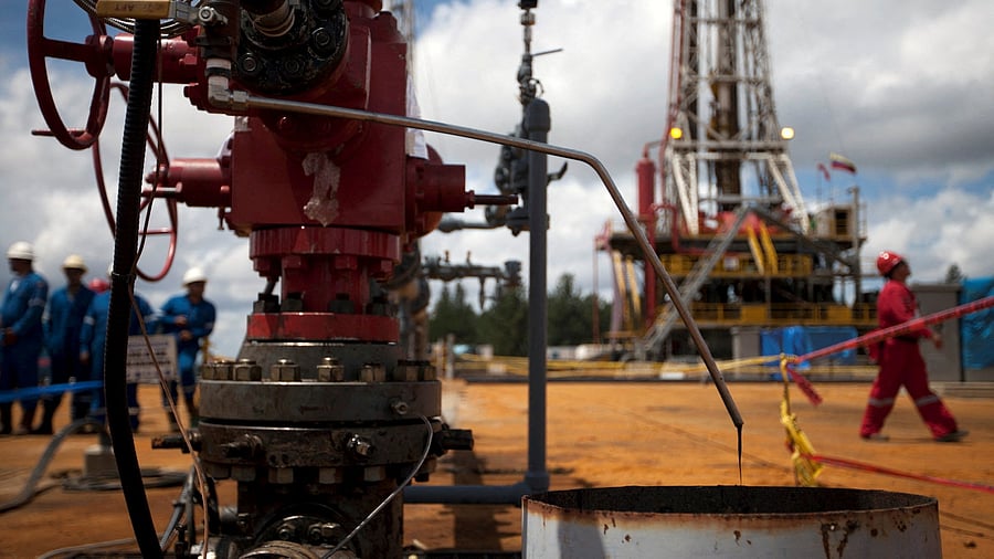<div class="paragraphs"><p>Crude oil drips from a valve at an oil well operated by Venezuela's state oil company PDVSA </p></div>