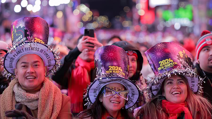 Revellers gather in Times Square during the celebrations of the New Year's Eve, in New York City, New York, U.S., December 31, 2023. REUTERS/Andrew Kelly