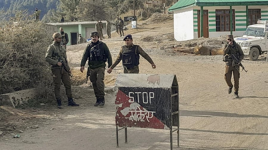 <div class="paragraphs"><p>Security personnel during a cordon and search operation, a day after two Army vehicles were ambushed by terrorists, in Poonch district, Friday, Dec. 22, 2023. At least five army personnel were killed and two others suffered injuries, according to officials.</p></div>