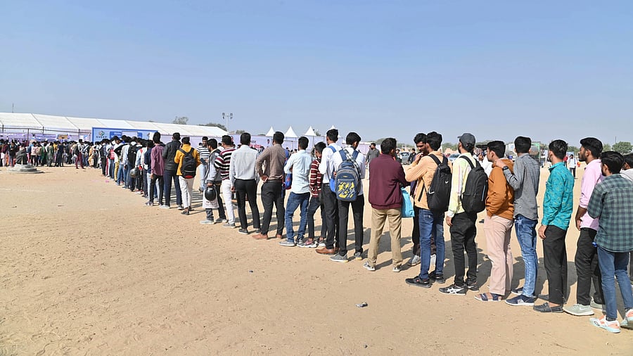 <div class="paragraphs"><p>In 2022, 24% of young graduates were unemployed. In pic, youth wait at a job fair in Bikaner. </p></div>