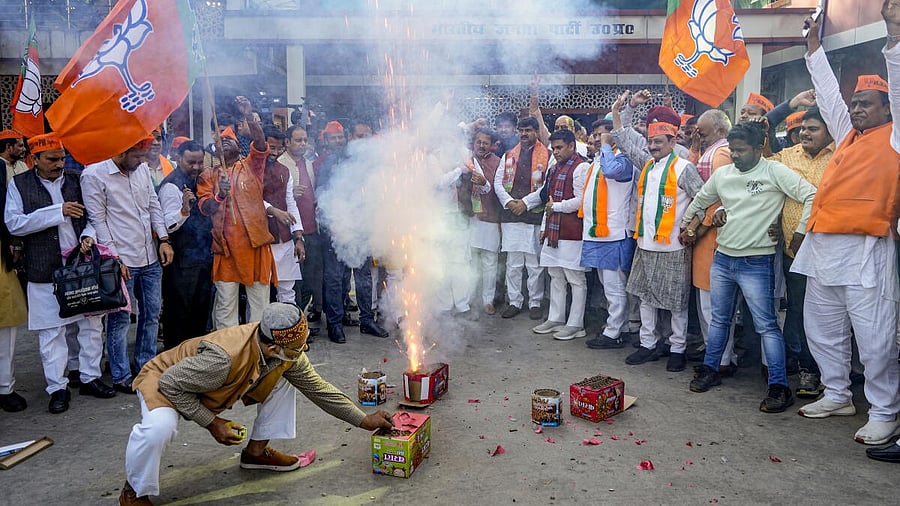 <div class="paragraphs"><p>BJP workers and supporters celebrate the party's lead in Madhya Pradesh, Rajasthan and Chhattisgarh during counting of votes for the Assembly elections, in Lucknow.&nbsp;</p></div>
