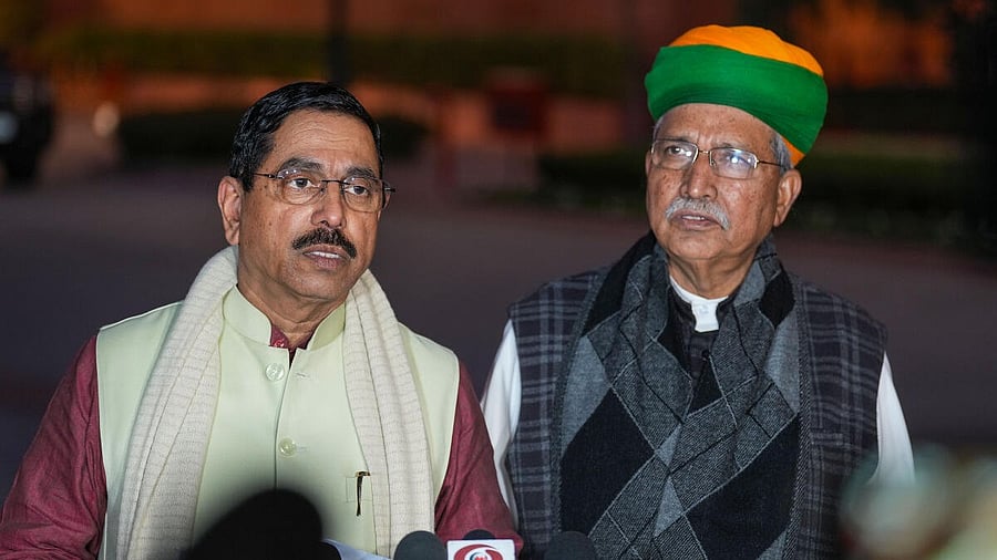 <div class="paragraphs"><p>Union Ministers Arjun Ram Meghwal and Pralhad Joshi brief the media during the Winter session of Parliament, in New Delhi, Tuesday, Dec. 19, 2023.</p></div>
