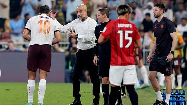 <div class="paragraphs"><p>Manchester City manager Pep Guardiola with Rodri during Urawa Red Diamonds vs Manchester City at the King Abdullah Sports City, Jeddah, Saudi Arabia, on December 19, 2023</p></div>