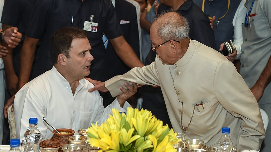 <div class="paragraphs"><p>Former president Pranab Mukherjee with Rahul Gandh.</p></div>