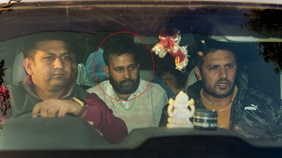 <div class="paragraphs"><p>Lalit Jha (C), key accused in the recent Parliament security breach, being produced at the Patiala House Court, in New Delhi, Friday, Dec. 15, 2023.</p></div>