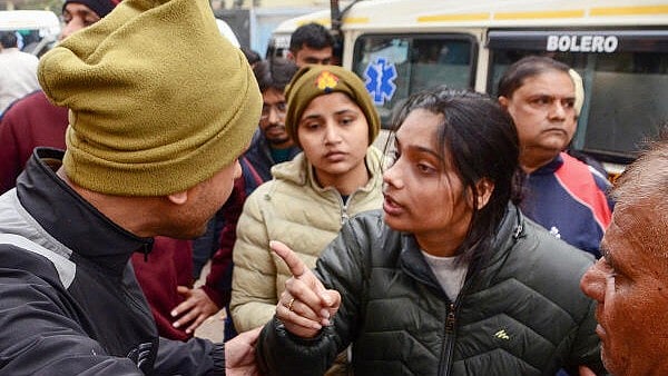 <div class="paragraphs"><p>Family of police constable Sachin Rathi who was shot in an encounter in Kannauj district, in Kanpur, Tuesday, Dec 26, 2023.</p></div>