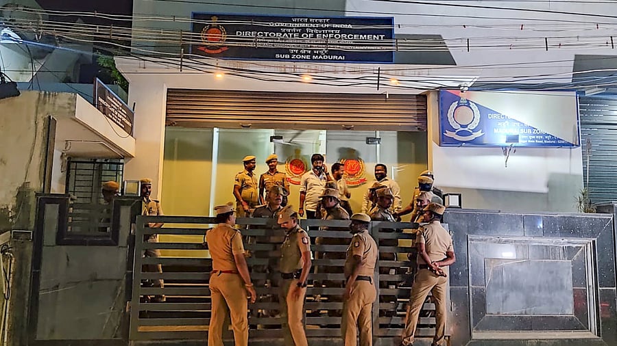 <div class="paragraphs"><p>Madurai: Police and Directorate of Vigilance and Anti-Corruption (DVAC) officials during a raid at the Enforcement Directorate's (ED) office after ED officer Ankit Tiwari was arrested for demanding and accepting a bribe of Rs 20 lakh from a government employee, in Madurai, Friday, Dec. 1, 2023. </p></div>