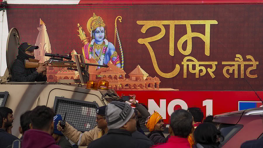 <div class="paragraphs"><p> A security personnel in an armoured vehicles keeps vigil ahead of the consecration ceremony of Ram Mandir, in Ayodhya.</p></div>