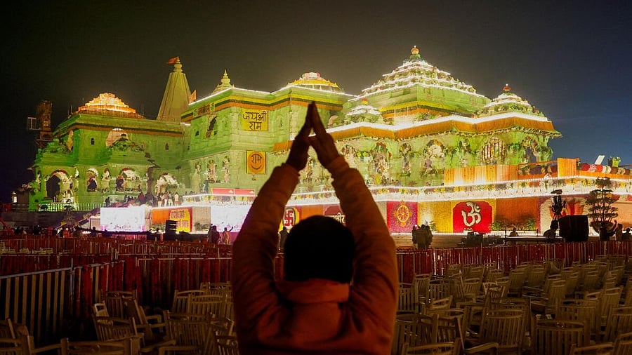 <div class="paragraphs"><p>A Hindu devotee prays near the Lord Ram temple after its inauguration, in Ayodhya, India, January 22, 2024.</p></div>