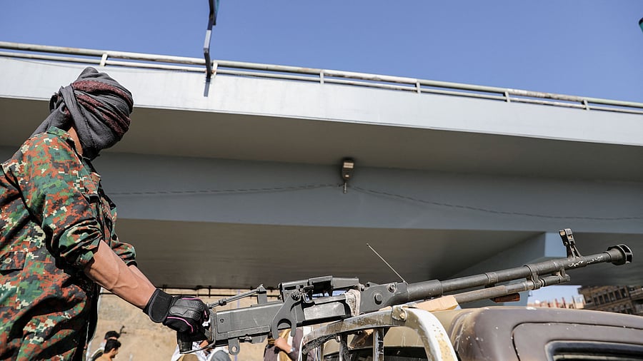 <div class="paragraphs"><p>A Houthi follower rides on the back of a pick-up truck during a parade in solidarity with the Palestinians in the Gaza Strip and to show support to Houthi strikes on ships in the Red Sea and the Gulf of Aden.</p></div>
