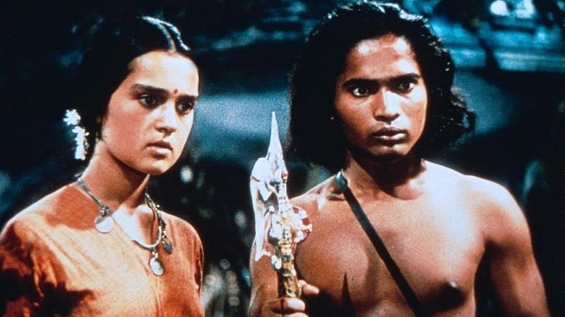 Sabu Dastagir as Mowgli with Patricia O'Rourke in Jungle Book (1942). 