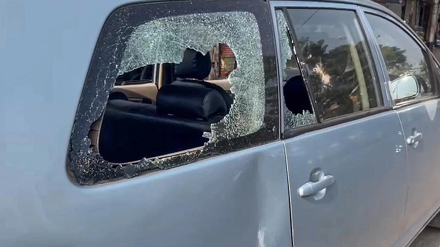 <div class="paragraphs"><p>Damaged window glass of a car which was allegedly damaged by the supporters of TMC leader Sheikh Sajahan during a raid by the ED officials at his residence, in North 24 Parganas district. </p></div>