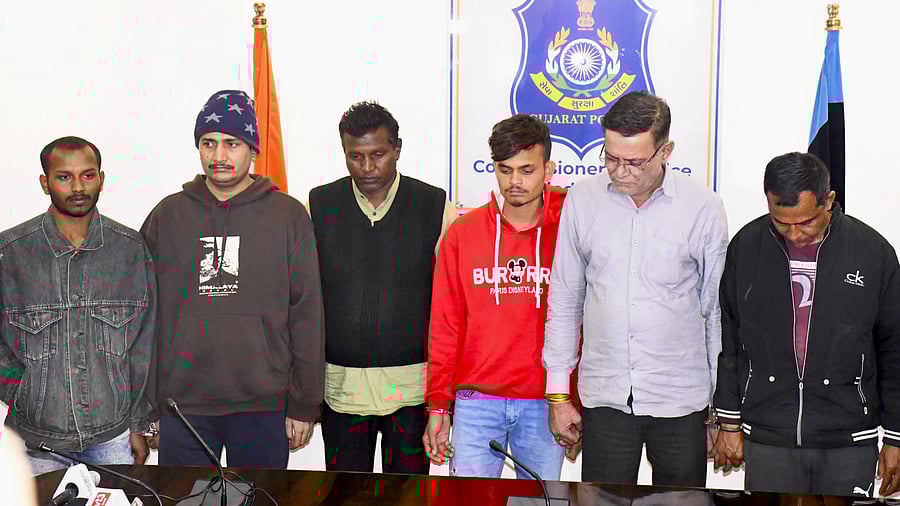 <div class="paragraphs"><p>Police personnel with the accused arrested in connection with the boat capsized case during a press conference, in Vadodara. </p></div>