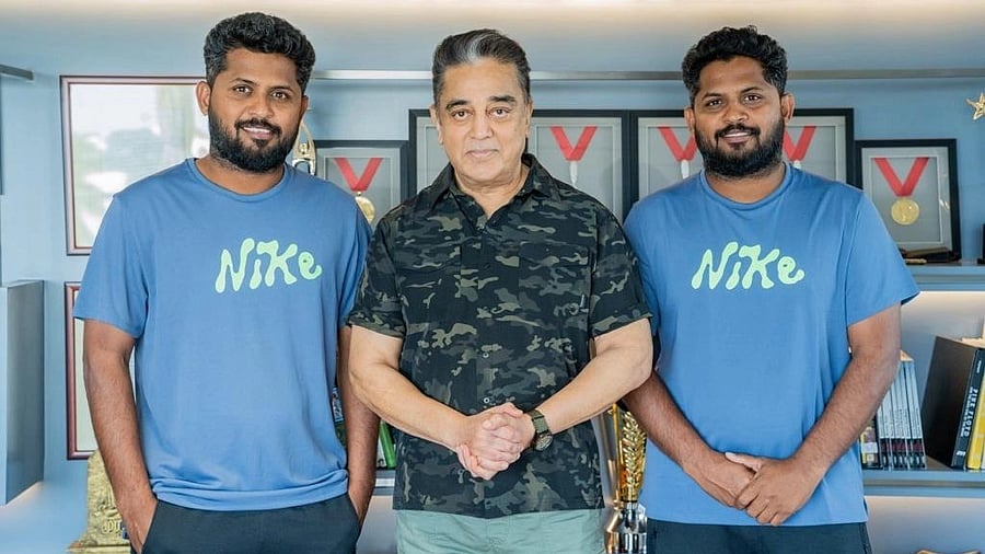 <div class="paragraphs"><p>Kamal Haasan flanked by&nbsp;action choreographer duo Anbariv.</p></div>