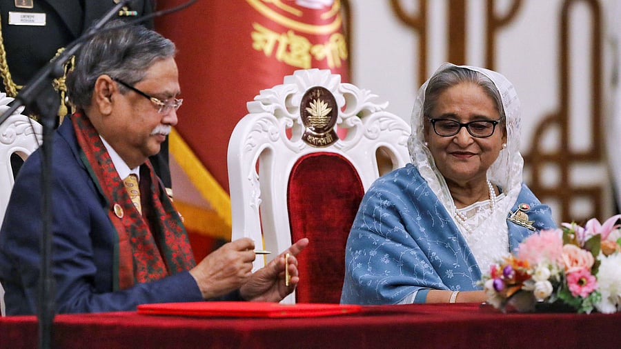 <div class="paragraphs"><p>Bangladeshi President Mohammed Shahabuddin administers Prime Minister Sheikh Hasina's oath-taking ceremony as the country's Prime Minister in Dhaka, Bangladesh, January 11, 2024.</p></div>