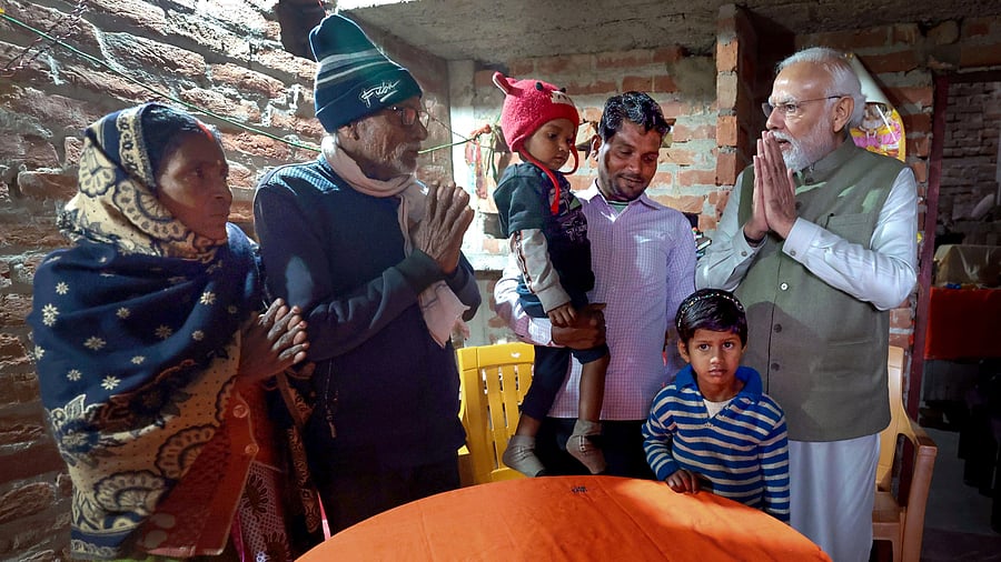 <div class="paragraphs"><p>Prime Minister Narendra Modi visits the house of a Ujjwala Yojana beneficiary, in Ayodhya, on Saturday, Dec. 30, 2023. </p></div>