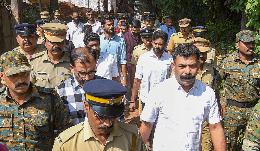 <div class="paragraphs"><p>Alappuzha: Police escort 15 members of the Popular Front of India (PFI) accused in the 2021 murder case of Bharatiya Janata Party's OBC leader Ranjith Sreenivasan, in Alappuzha, Tuesday, Jan. 30, 2024. </p></div>