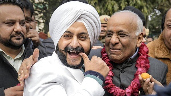 <div class="paragraphs"><p>AAP candidate Narain Dass Gupta (R) with party's MLA Jarnail Singh after filing his nomination papers for the upcoming Rajya Sabha elections, in New Delhi.</p></div>