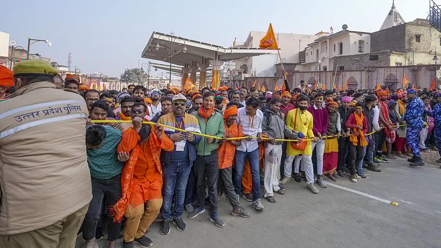 <div class="paragraphs"><p>Devotees wait to enter the Ram temple, in Ayodhya.</p></div>