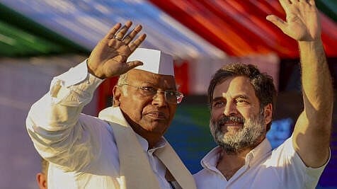 <div class="paragraphs"><p>Congress President Mallikarjun Kharge with the party leader Rahul Gandhi.</p></div>