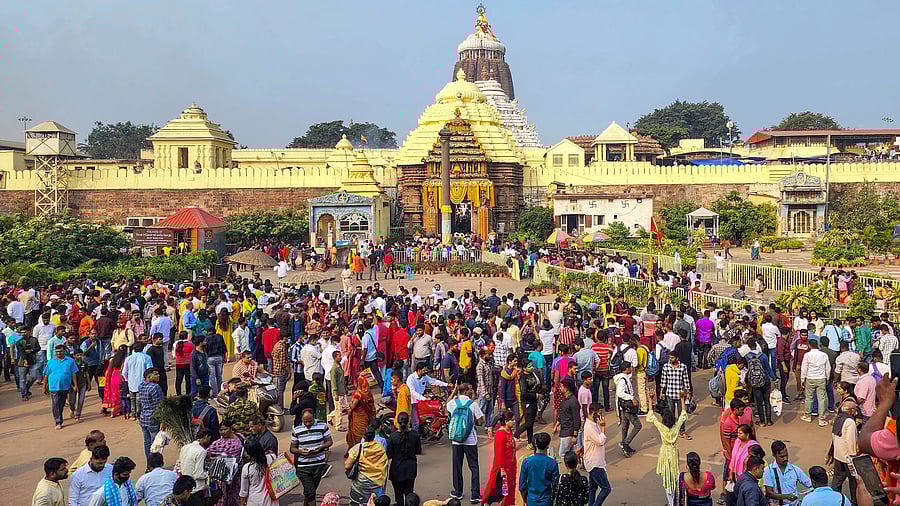 <div class="paragraphs"><p>Devotees throng the Shree Jagannath temple in Puri. </p></div>