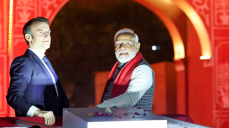 <div class="paragraphs"><p>Emmanuel Macron and Narendra Modi during the road show in Jaipur.</p></div>