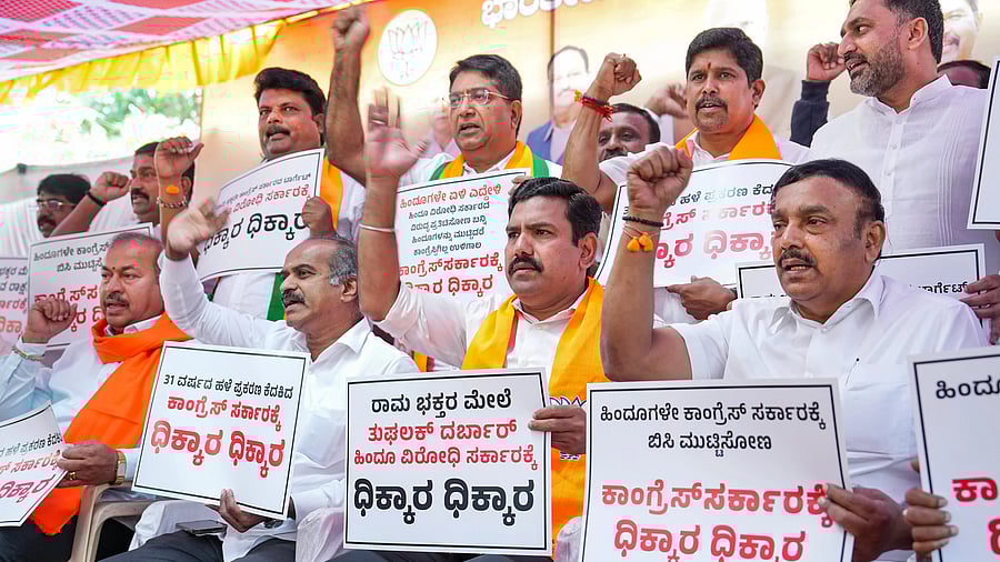 <div class="paragraphs"><p>Karnataka BJP President B. Y. Vijayendra, MP P C Mohan and party leaders during a protest condemning the arrest of Hindutva activist Srikanth Poojari in connection with a 1992 rioting case post-Babari mosque demolition, in Bengaluru</p></div>
