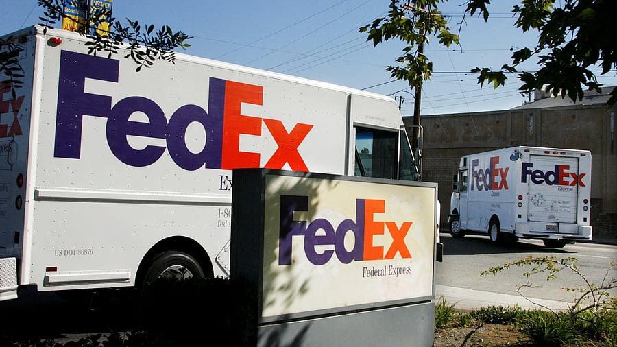 <div class="paragraphs"><p>Federal Express trucks head out for deliveries from a FedEx station in Los Angeles. </p></div>