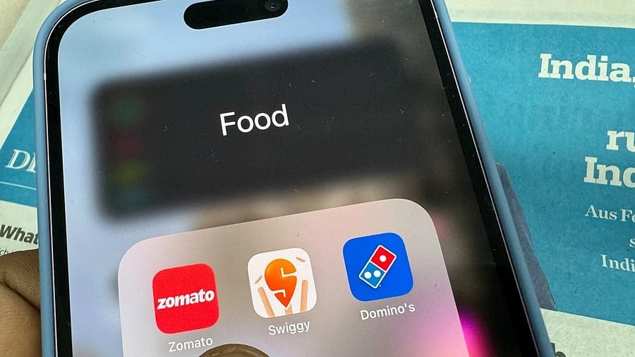 <div class="paragraphs"><p>Swiggy app seen on a phone screen.</p></div>