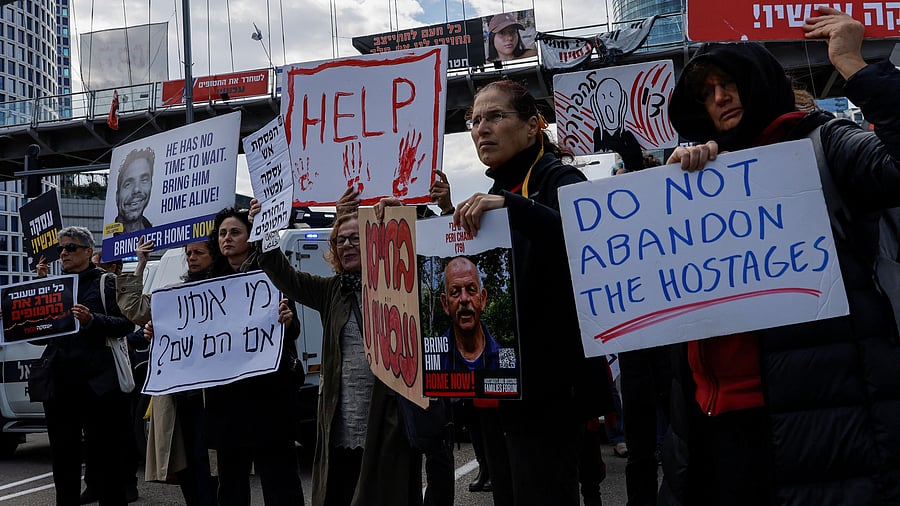 <div class="paragraphs"><p>Demonstrators obstruct traffic on a road to protest and demand the release of hostages kidnapped in the deadly October 7 attack on Israel by the Palestinian Islamist group Hamas, in Tel Aviv, Israel, January 29, 2024. </p></div>