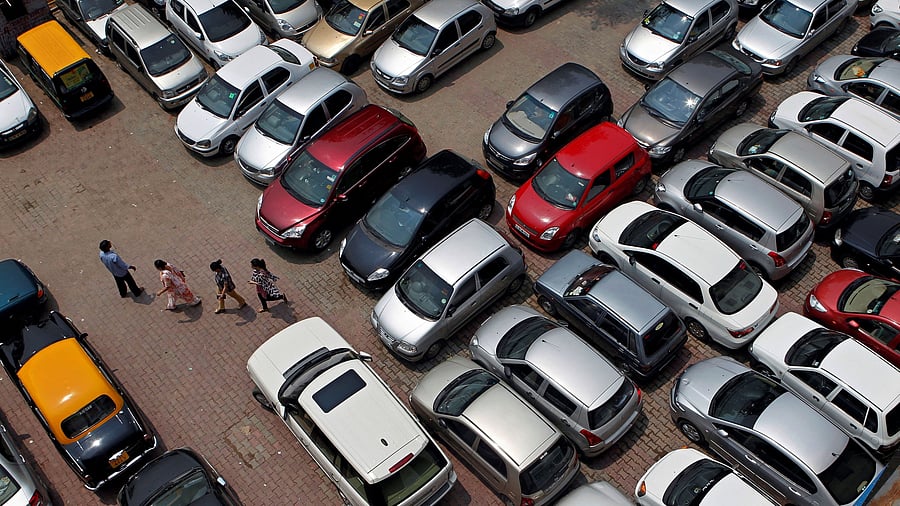 <div class="paragraphs"><p>People walk through a car parking lot in New Delhi. (Representative image)</p></div>