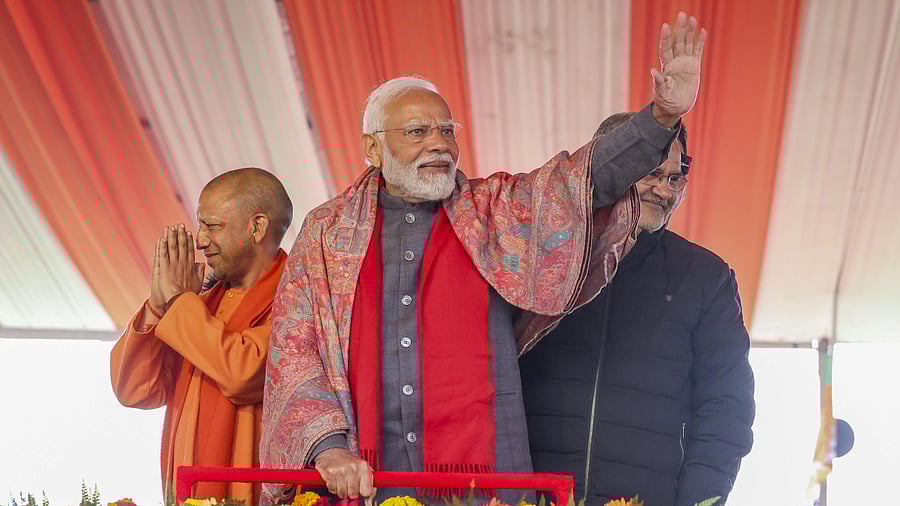 <div class="paragraphs"><p>Prime Minister Narendra Modi with Uttar Pradesh Chief Minister Yogi Adityanath during the inauguration and foundation stone laying ceremony of various developmental projects, in Bulandshahr, Thursday, January 25, 2024. </p></div>