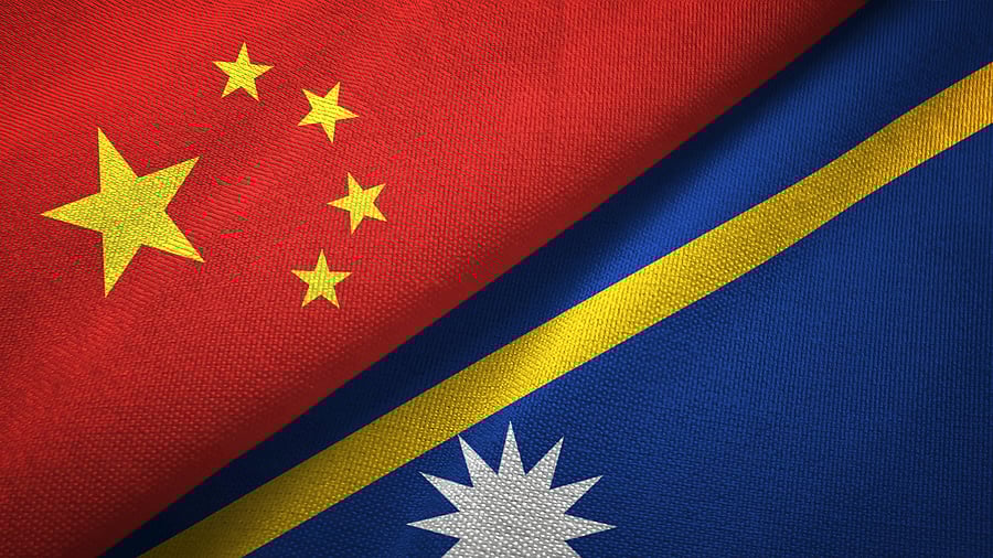 <div class="paragraphs"><p>Nauru and China flags together.</p></div>