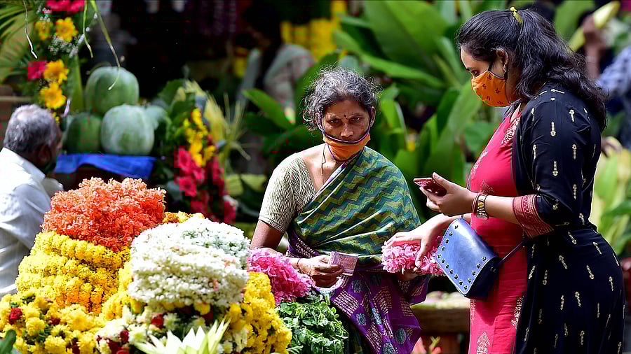 <div class="paragraphs"><p>Vendors like her at the Malleswaram market&nbsp;grapple with dwindling incomes and dire conditions in their temporary shelters.</p></div>
