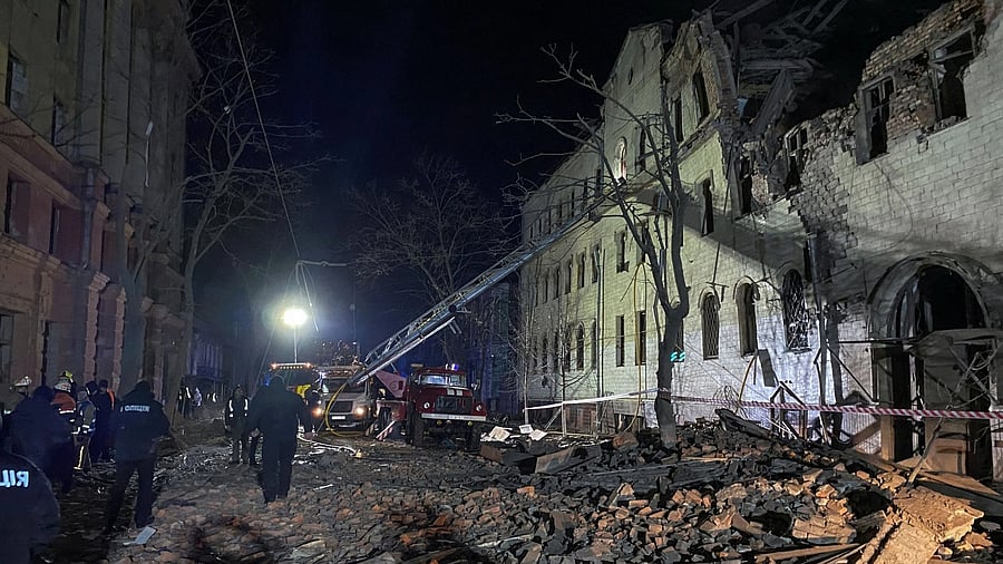 <div class="paragraphs"><p>Rescuers and police officers work at a site of a residential building heavily damaged by a Russian missile strike, amid Russia's attack on Ukraine.</p></div>