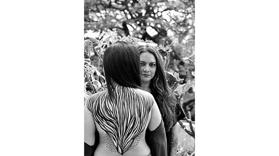 <div class="paragraphs"><p>The author poses with artist Nidhi Mariam Jacob who started the Breathing Canvas series.</p></div>
