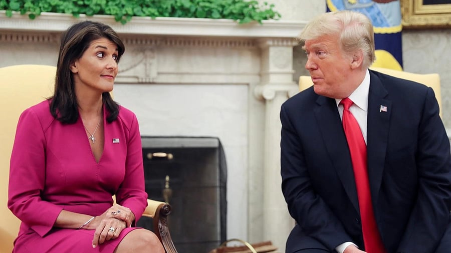 <div class="paragraphs"><p>Donald Trump talks with Nikki Haley</p></div>