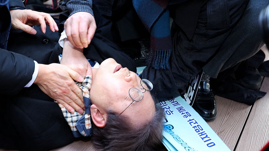 <div class="paragraphs"><p>South Korea's opposition party leader Lee Jae-myung falls after being attacked by an unidentified man during his visit to Busan, South Korea, January 2, 2024. </p></div>