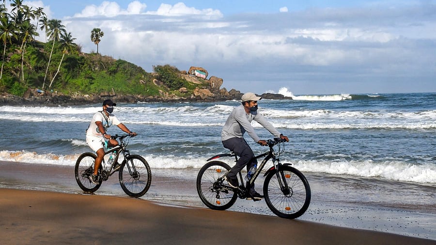 <div class="paragraphs"><p>Representative image of tourists at a beach in&nbsp;Thiruvananthapuram.</p></div>